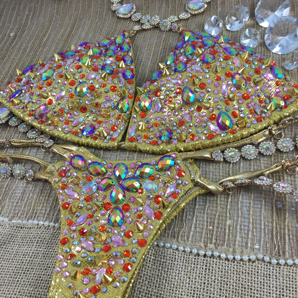 Custom Triangle Style Deluxe Golden studded Bling Themewear with wings $999 or bikini only $749 (This exact swatch may sell out and substitue used)